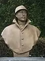 Statue of Albert I of Belgium with Adrian helmet distinguished by lion's head insignia