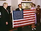 American Ambassador James Collins (left) and Alexandr Bykov (center) at the official opening of the two museum's halls on 25 June 1998