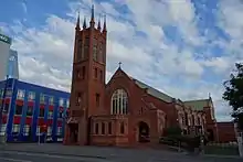 view of a brick church