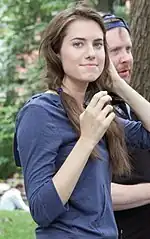 Allison Williams wearing her hair in pigtails.