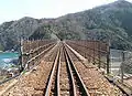 A view of the tracks from the Amarube Station end of the bridge