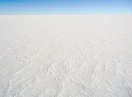 aerial view of ice sheet covered in snow Antarctica