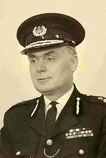 A black and white photograph of Hambleton in police uniform