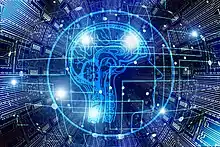 An artistic representation of AI where a cross section of a human head and brain in profile is mixed with a circuit like background and overlay