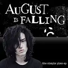 Black background with the words "August is Falling" and "The Simple Plan. There is the head of a frowning man with long dark hair and the symbol for a frowny face.