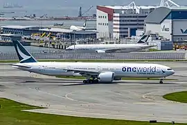 A Boeing 777-300ER (B-KQI) in Oneworld special livery