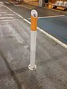 A bollard that also serves as an ashtray at Brussels Airport