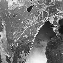 A top-down, black-and-white photograph of Shadow Mountain Lake.