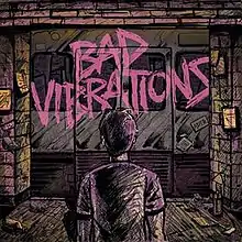 A parody of their debut album "And Their Name Was Treason", but the only difference is that it is animated and it is called "Bad Vibrations". The man is looking at train tracks. The train reads "Bad Vibrations" in pink. "ADTR" can be seen on the train. Bricks appear above the train, as well as next to it in both ways. The ground is made of wood. Wood appears as well at the bottom of the train.