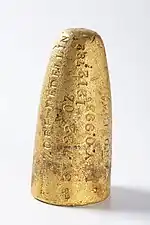 Gold bar from the Medellín Mint in shape of a projectile, 1944