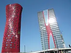 Hotel Porta Fira (left) in Barcelona, Spain, by Toyo Ito