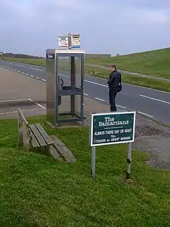 The phone box and accompanying sign