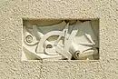 Bas-relief of the Blomme House in Brussels representing the architect's instruments