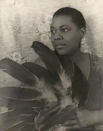 Image 11Bessie SmithPhotograph credit: Carl Van Vechten; restored by Adam CuerdenBessie Smith (April 15, 1894 – September 26, 1937) was an American blues singer widely renowned during the Jazz Age. She is often regarded as one of the greatest singers of her era and was a major influence on fellow blues singers, as well as jazz vocalists.Born in Chattanooga, Tennessee, her parents died when Smith was young, and she and her sister survived by performing on the streets of Chattanooga, Tennessee. She began touring and performed in a group that included Ma Rainey, and then went out on her own. Her successful recording career began in the 1920s, until an automobile accident ended her life at age 43.More selected pictures