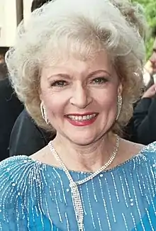 Photograph of a senior white woman smiling