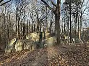 The rocks and the entrance to the rock shelter as you approach from the south