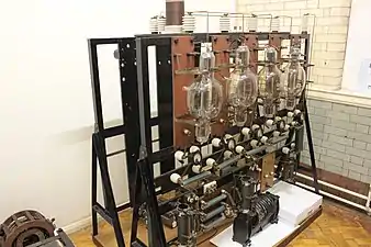 One of the BBC's first broadcast transmitters, early 1920s, London.  The 4 triode tubes, connected in parallel to form an oscillator, each produced around 4 kilowatts with 12 thousand volts on their anodes.