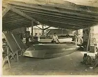 Bill Farley building a speedboat at Farley and Son, Boat Builders