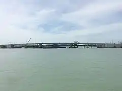 The current swing bridge with the original behind it prior to demolition