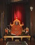 Bodhinatha on the Guru Peedham (the seat of authority) of Kauai Aadheenam