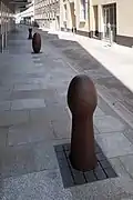 Cast iron bollards in Saint Helier, Jersey, designed by Sir Antony Gormley