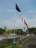 Flagpoles at the shrine with select flags of the Katipunan hoisted.