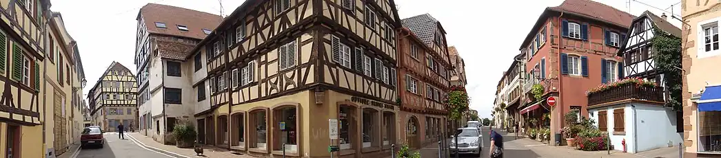 Panorama of historic buildings in the center of an old French town