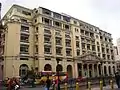 Bank of the Philippine Islands at Don Román Santos Building, a neo-classical, Graeco-Roman structure at Plaza Goiti (now Plaza Lacson)