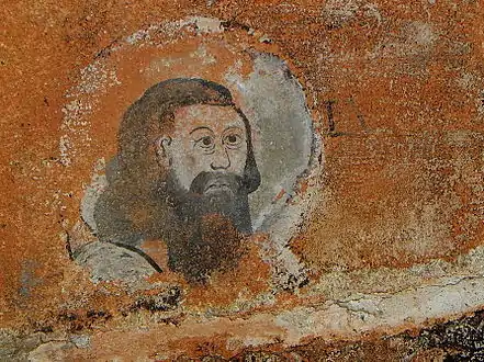 One of the paintings in the porch vaulting