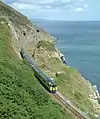 The railway along the cliffs of Bray Head with traces of the old alignment