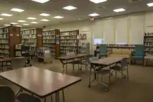 A small beige library reading room