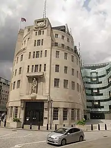 Image 44The British Broadcasting Corporation's landmark and iconic London headquarters, Broadcasting House, opened in 1932. At right is the 2005 eastern extension, the John Peel wing. (from History of broadcasting)