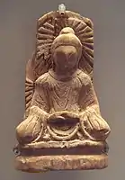 A Buddha statue from Tumshuq, Xinjiang. 5th century.