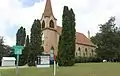 Budsin sign and St. John Lutheran Church