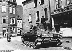 Panzer III tank with an N.K.A.V. mounted above the right muffler.