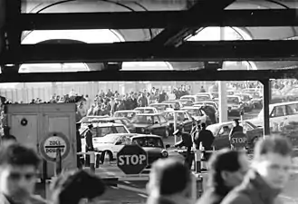 Crowds of East Germans stream towards the Bornholmer Straße crossing on 10 November 1989, a day after the fall of the Berlin Wall.