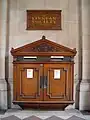 A wooden wall box in Burlington House, London.