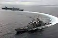 USS Lake Champlain conducting an emergency breakaway after refueling at sea, 2004.