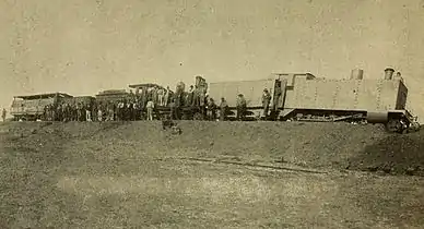 Photo of an armoured CGR 3rd Class 4-4-0 1889 locomotive derailed on 12 October 1899 during the first engagement of the Second Boer War at Kraaipan