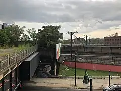 Footbridge and station hall site seen from Mulberry Commons