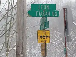 Signpost marking the hamlet of New Albion