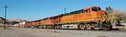 A BNSF freight passing through Caliente climbs eastbound toward Mojave, California.