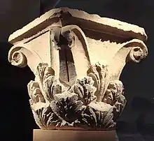 The capital of a Corinthian column, showing detail of leaf carvings