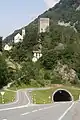 The main road through the valley passes under the Castelmur