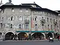 Casa Cazuffi and casa Rella, in the central Piazza Duomo