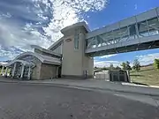 Cedar Grove Station bus circle, waiting area, and skyway to central island platform.