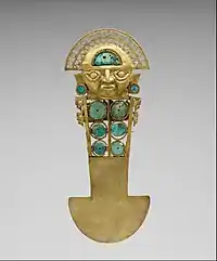 Ceremonial knife (tumi); 10th-13th century; gold, turquoise, greenstone & shell; height: 33 cm (1 ft. 1 in.); Metropolitan Museum of Art