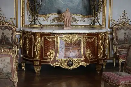 Louis XVI style altantes on a commode, by Jean-Henri Riesener, 1775, gilt brone, marble top, and various types of wood, Musée Condé, Chantilly, France