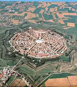 Image 3Palmanova, Italy, constructed in 1593 according to the defensive ideal of the star fort, today retains its distinctive geometry. (from History of cities)