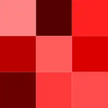 A series of squares in various shades of red